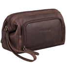Bruine leren toilettas Henry met STILORD reliëflogo, voorvak en polsband, schuine zijaanzicht